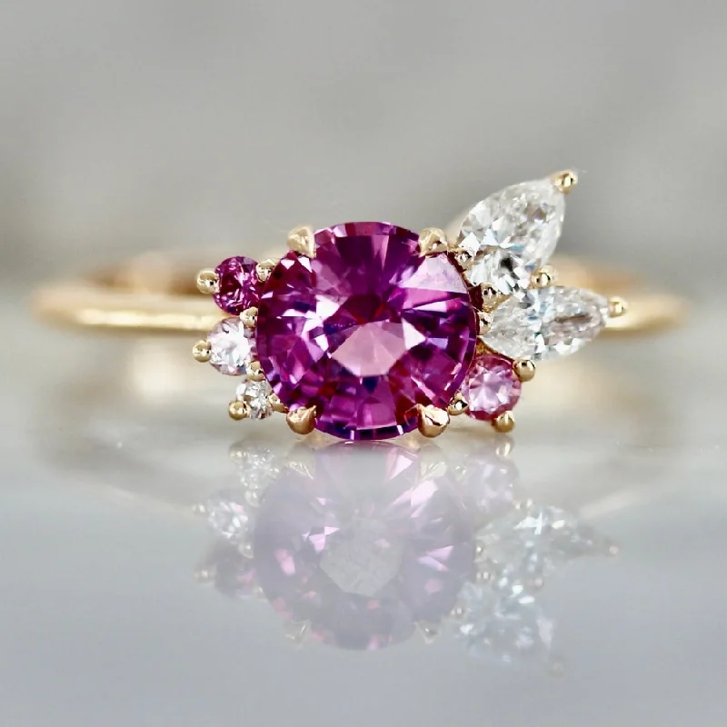 luxury rings for brides -Pink Moon Round Cut Asymmetrical Sapphire Cluster Ring