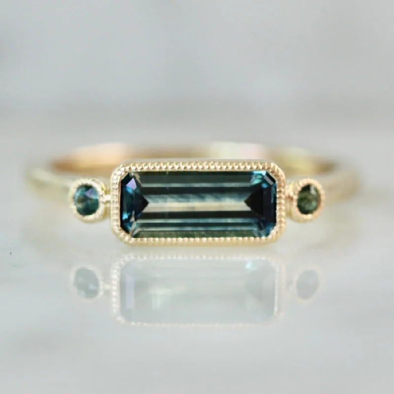 simple wedding bands for women -Must Sea Teal Emerald Cut Montana Sapphire Ring