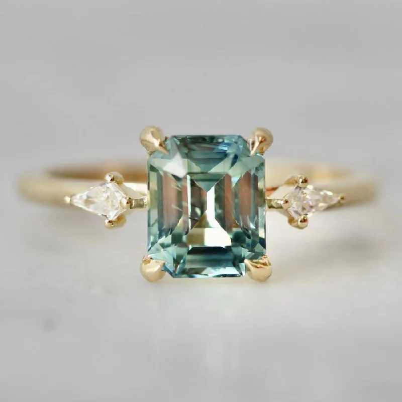 infinity rings for women -Boardwalk Light Teal Emerald Cut Sapphire Ring